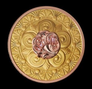 the Opulence Collection includes this 1 oz gold coin adorned with 4 pink diamonds