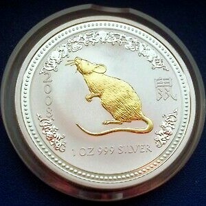 reverse side of the gilded 2008 issue of the Silver Lunar coins