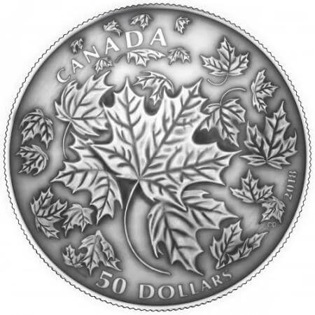 reverse side of the collectible Maple Leaves in Motion 5 oz convex antique Silver Maple Leaf coin that was issued in 2018