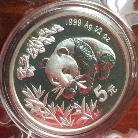 reverse side of the 1998 issue of the 1/2 oz BU Silver Panda coin