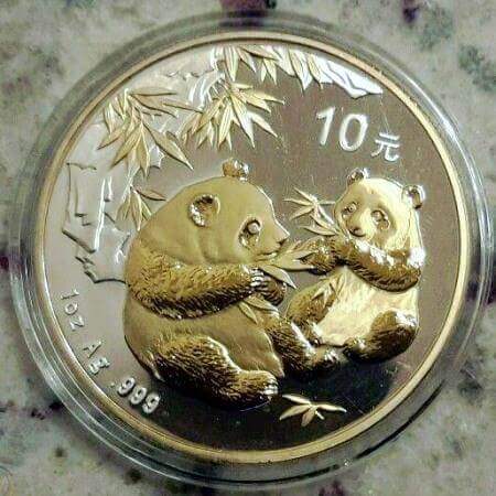 reverse side of the gilded 2006 issue of the 1 oz BU Chinese Silver Panda coin